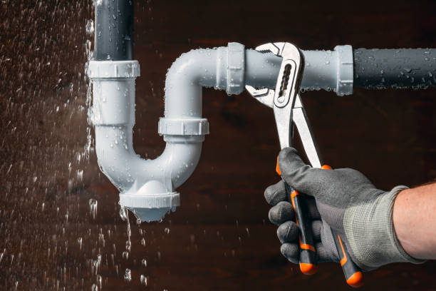 Professional Plumbing technician working in Woburn, MA